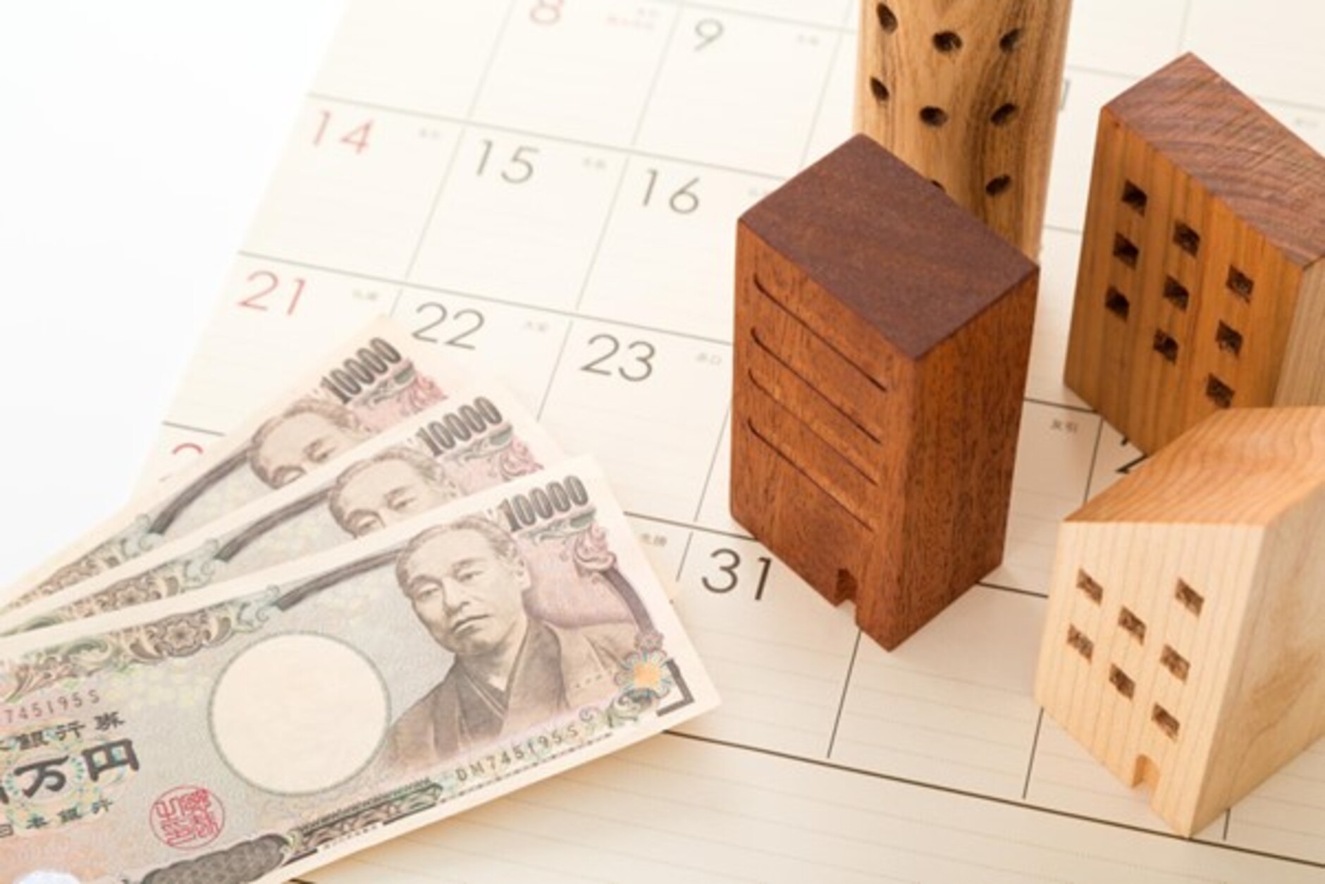 カレンダーと木の家と3万円