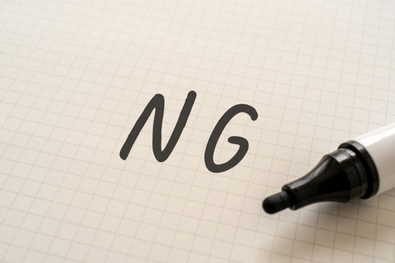 「NG」と書かれたノート